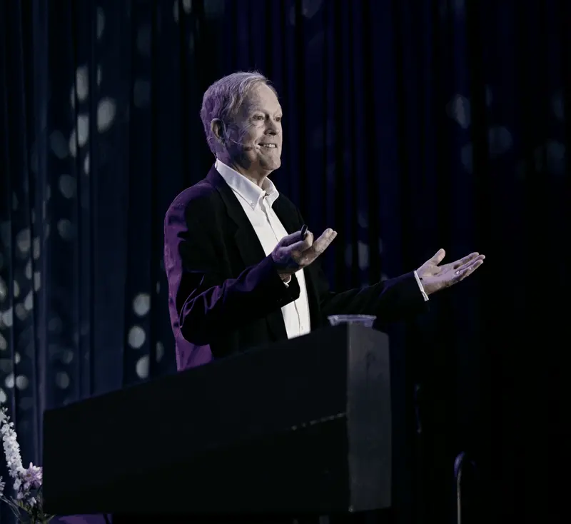 Robert Lufkin presenting from a lectern